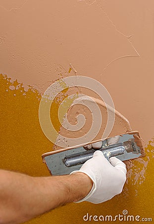 Plastering using a trowel Stock Photo