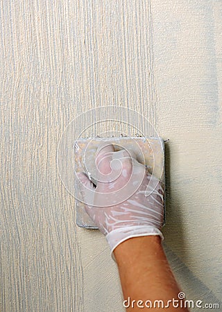 Plastering using a trowel Stock Photo