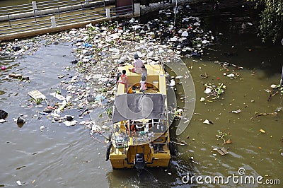 Plastic bags and other garbage float on river Chao Phraya Editorial Stock Photo