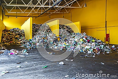 Plastic bales at the waste processing plant. Separate garbage collection. Recycling and storage of waste for further disposal. Editorial Stock Photo