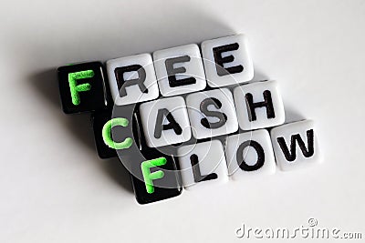 Plastic Beads Spelling `Free Cash Flow` On White Stock Photo