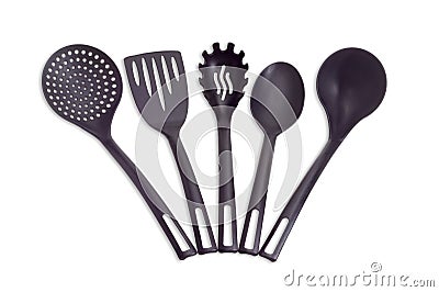 Plastic black cooking utensils on a light background Stock Photo