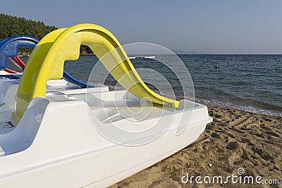 Plastic boat near by the seashore Stock Photo