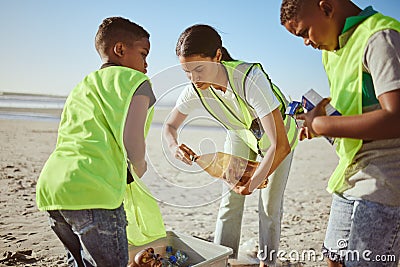 Plastic bottle, beach and woman with children recycling, cleaning and learning, education and community for pollution Stock Photo
