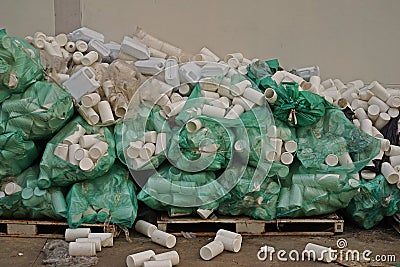 Plastic bottle container improper storage, warehouse management Stock Photo