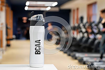 Plastic bottle or cup with fitness drink of branched-chain amino acid close up Stock Photo