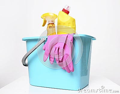 Plastic bucket with desinfctant bottles.Housekeeping objects.Sanitary items.Housework supplies Stock Photo