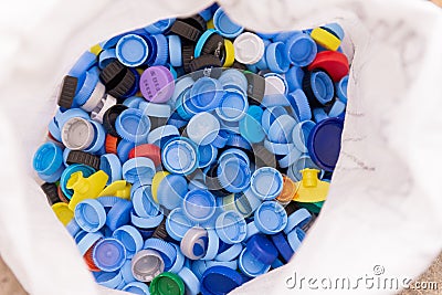 Plastic caps in a bag Editorial Stock Photo