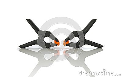 Plastic clamps on a white background Stock Photo