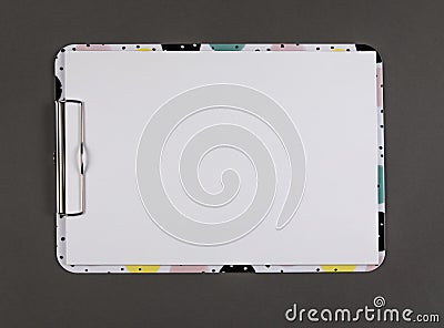 Plastic clipboard with blank paper sheet. Stock Photo