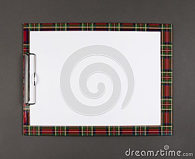 Plastic clipboard with blank paper sheet. Stock Photo