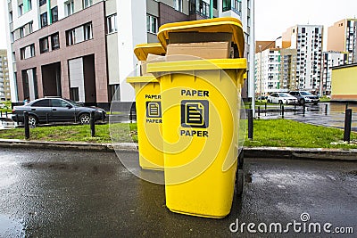 Plastic containers for waste paper in the city yard Stock Photo