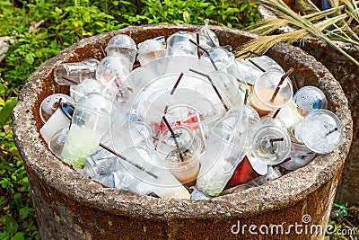 Plastic cups in trashcan. Stock Photo