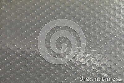 Abstract background of lots of grey pimples dots. Plastic surface with pimples Stock Photo