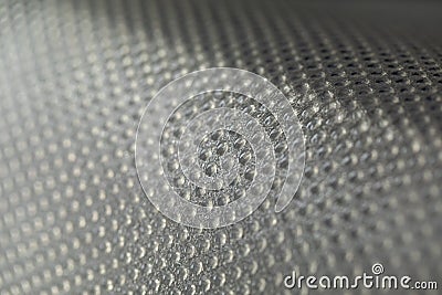 Abstract background of lots of grey pimples dots. Plastic surface with pimples Stock Photo