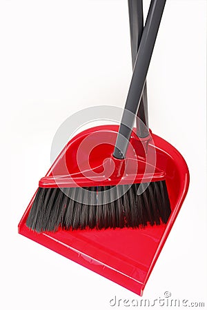 Plastic dustpan and broom Stock Photo