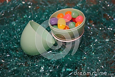 Plastic egg with jelly beans Stock Photo