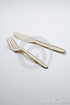 Plastic fork and knife, Mobile phone wallpaper, vertical Stock Photo
