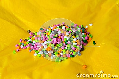 Plastic granules on plastic polyethylene film .Plastic pellets. Plastic Raw material Stock Photo