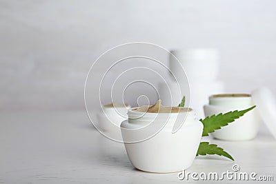 Plastic jar with hemp lotion Stock Photo