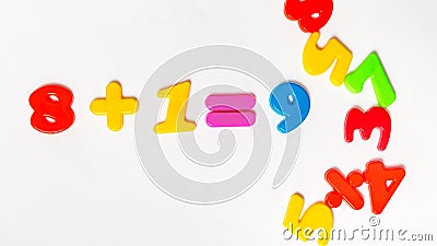 Plastic numbers. study of mathematics, mathematical calculation on white background. School concept Stock Photo