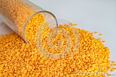 Plastic pellets, industrial beads on white color background. Stock Photo