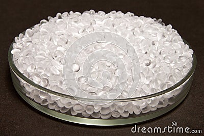 Plastic pellets. Transparent Polyethylene granules. Plastic Raw Stock Photo