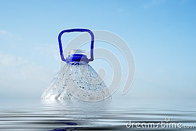 Plastic PET drink bottle floating in sea water Stock Photo