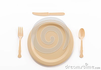 plastic plate spoon fork and knife Stock Photo