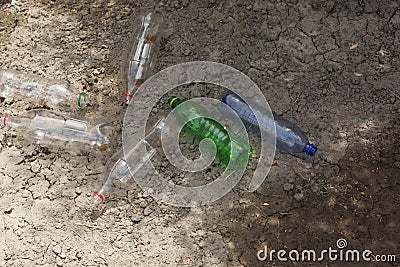 Plastic pollution on land. Waste, trash. Nature and plastic Stock Photo