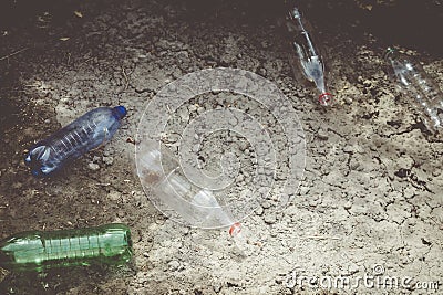 Plastic pollution on land. Waste, trash. Nature and plastic Stock Photo