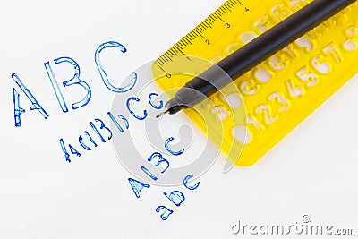 Plastic alphabet stencil Stock Photo