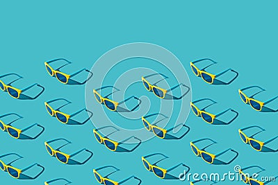 Minimalist background of many stylish yellow sunglasses with harsh shadow as summer concept. Stock Photo