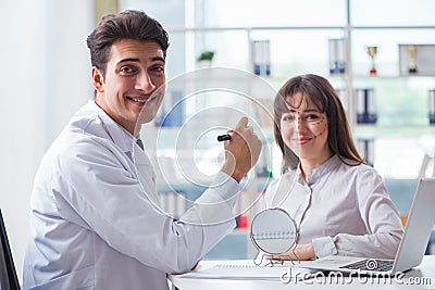 The plastic surgeon preparing for operation on woman face Stock Photo