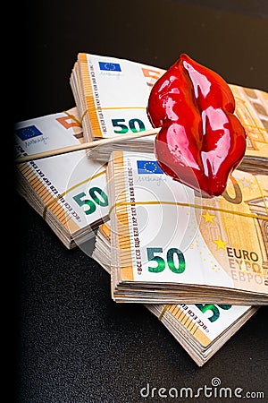 Cropped view of woman red lips on euro banknote, isolated on black, lips plastic surgery Stock Photo