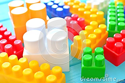 Plastic toy bricks close up. Child delelopment concept. Stock Photo