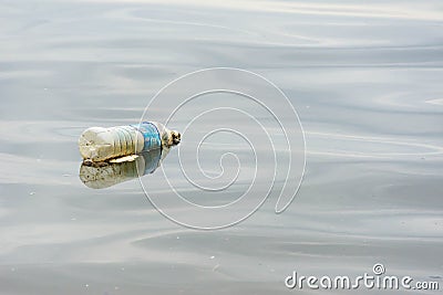 plastic trash garbage on the bay walk polluting the ocean and en Editorial Stock Photo