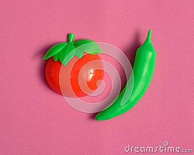 Plastic vegetable collection set of tomato and chili on isolated white background Stock Photo