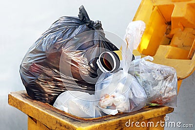 Plastic waste bag black garbage on bin, Dump, Plastic waste, Pile of Garbage Plastic Waste Bottle and Bag Foam tray many on bin Stock Photo