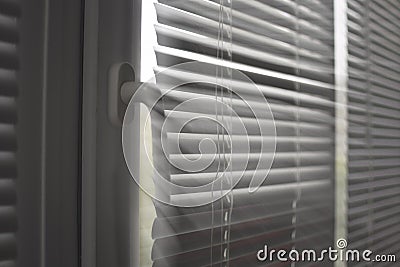 Plastic window with blinds Stock Photo