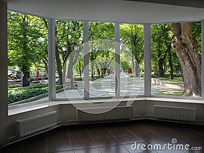 Plastic windows overlooking the city park Editorial Stock Photo