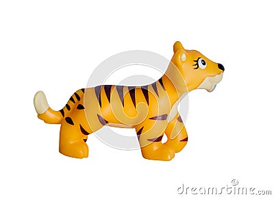 Plastic yellow toy, Smilodon. Stock Photo