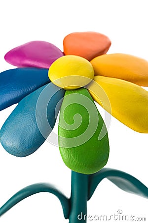 Plasticine colorful flower with leaves in brown pot Stock Photo