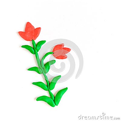 Plasticine flowers on white background Stock Photo