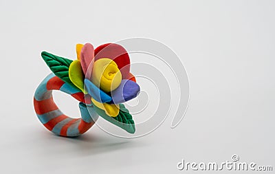 Plasticine Hand Made Flowers. Flowers made of clay isolated on w Stock Photo