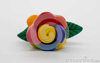 Plasticine Hand Made Flowers. Flowers made of clay isolated on w Stock Photo