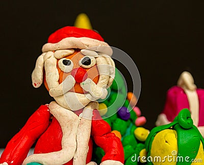 Plasticine Santa Claus wishes everyone good luck! Stock Photo