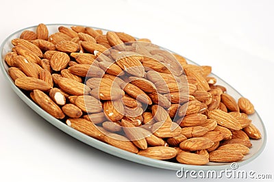 Plate of Almonds Stock Photo