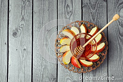 Plate with apple and honey for Jewish Holiday Rosh Hashana (New Year). View from above with copy space Stock Photo