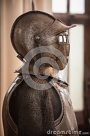Plate armour medieval armor, armed fighter profile. Historical type of personal body armour made from bronze, iron or steel Stock Photo
